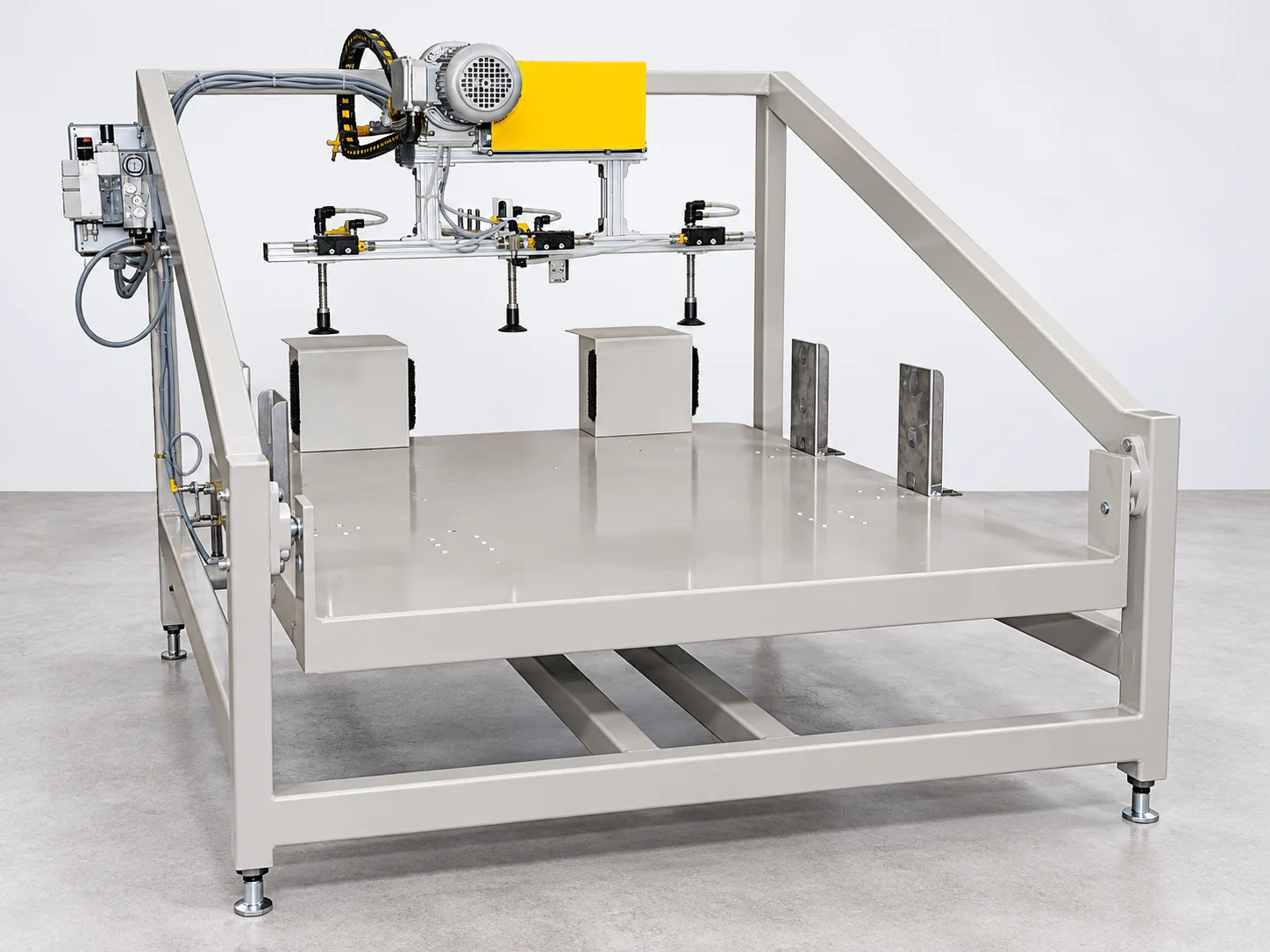 Saturn SA25 automated slip sheet dispenser with vacuum pickup assembly and steel support frame